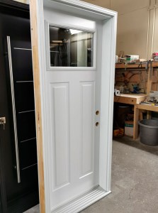 Craftsman door. White. Steel