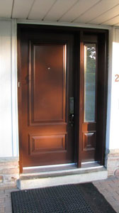 Raised panels on chestnut brown door